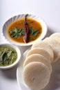 Idli with Sambar in bowl on white background, Indian Dish Royalty Free Stock Photo