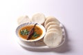 Idli with Sambar in bowl on white background, Indian Dish Royalty Free Stock Photo