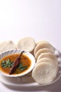 Idli with Sambar in bowl on white background, Indian Dish Royalty Free Stock Photo