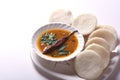 Idli with Sambar in bowl on white background, Indian Dish Royalty Free Stock Photo