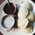 IdlI south indian dish with red and white chutney Royalty Free Stock Photo