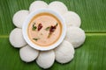 Idly or Idli popular South Indian breakfast with coconut chutney