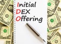 IDO initial DEX offering symbol. Concept words IDO initial DEX offering on beautiful white note. Dollar bills. Beautiful dollar Royalty Free Stock Photo