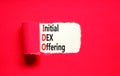 IDO initial DEX offering symbol. Concept words IDO initial DEX offering on beautiful white paper. Beautiful red paper background.