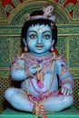 Idol of Goddess Laddu Gopal or little Lord Krishna at a decorated puja pandal in Kolkata