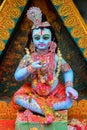 Idol of Goddess Laddu Gopal or little Lord Krishna at a decorated puja pandal in Kolkata