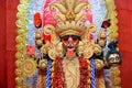 Idol of Goddess Maa Kali at a decorated puja pandal in Kolkata, West Bengal, India. Royalty Free Stock Photo