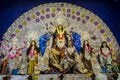 Idols of Hindu Goddess Maa Durga with her childrens in a pandal beautifully decorated during the Durga Puja festival Royalty Free Stock Photo