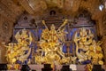 Idols of Hindu Goddess Maa Durga with her childrens in a pandal beautifully decorated during the Durga Puja festival. Royalty Free Stock Photo