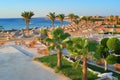 Idylic beach with palms and sun umbrelas, Red Sea, Egypt Royalty Free Stock Photo