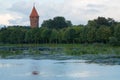 Idylic view of nature around Malbork castle. Red tower and conical roof. Poland Royalty Free Stock Photo