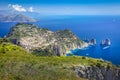 Above Capri city cliffs and Faraglioni with boats and yacht, amalfi coast, Italy Royalty Free Stock Photo