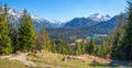 Idyllic alpine landscape, view from Kranzberg mountain trail to lake Lautersee and the alps Royalty Free Stock Photo