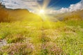 Idyllic Alpine scene in sun rays Royalty Free Stock Photo