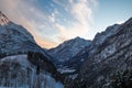 Idyllic alpine snowy mountain view in sunset sky, julian alps, Slovenia Royalty Free Stock Photo