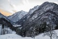 Idyllic alpine snowy mountain view in sunset sky, julian alps, Slovenia Royalty Free Stock Photo