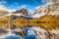 Idyllic autumn landscape with mountain lake and Alps Royalty Free Stock Photo