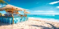 Idyllic beach bar with stools and umbrellas on sandy shore offering a tranquil place for relaxation and socializing with a view of