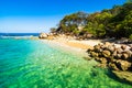 Idyllic beach in Labadee Island, Haiti. Exotic wild tropical beach with white sand and clear turquoise water