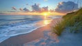 Idyllic Beach Sunrise with Gentle Waves and Lush Grass Royalty Free Stock Photo