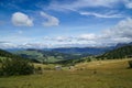 Idyllic and calm Alp scenery: the worldfamous alp de Siusi in the dolomites. Green meadow and a blue sky with some white clouds. s Royalty Free Stock Photo