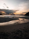 Idyllic coastal landscape with a beautiful sunset in the background.