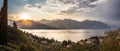 Idyllic coastline in Italy: Blue water and a cute village at lago di garda, Malcesine, sunset Royalty Free Stock Photo