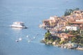 Idyllic coastline scenery in Italy: Blue water and a cute village at lago di garda, Malcesine Royalty Free Stock Photo