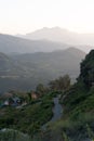 Idyllic country landscape featuring an empty path winding through a picturesque hillside. Royalty Free Stock Photo