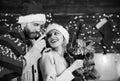 Idyllic date. Man woman santa claus hats cheerful celebrating new year. Romantic ideas celebration. Merry christmas