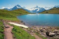 Idyllic hiking trail bachalpsee with stunning mountain view