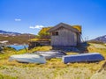 Idyllic hut with fishing boats near vavatn lake Hemsedal Norway Royalty Free Stock Photo