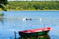 Idyllic lake with rowing boat Royalty Free Stock Photo