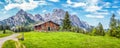 Idyllic landscape in the Alps with mountain chalet Royalty Free Stock Photo