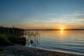 Idyllic landscape. Amazing colorful sunset scene on a quiet lake in summer Royalty Free Stock Photo