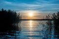 Idyllic landscape. Amazing colorful sunset scene on a quiet lake in summer Royalty Free Stock Photo