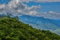 Idyllic landscape of rolling green hills and a vibrant blue sky in the background. Ethiopia. Royalty Free Stock Photo