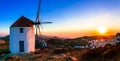 Idyllic landscape with windmills over sunset. Amorgos isalnd, Gr