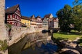 Idyllic panorama in a German old town on a river with city wall and half-timbered houses Royalty Free Stock Photo