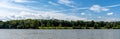 Idyllic panorama view of the Rhine River banks and forests in northeastern Siwtzerland near Basel Royalty Free Stock Photo