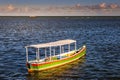 Idyllic Porto Seguro Beach with lonely fishermen trawler boat, BAHIA, Brazil Royalty Free Stock Photo