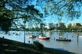 Idyllic river scenery with boats in the middle of the major city Brisbane Australia