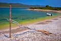 Idyllic rocky beach Sakarun and small boat on Dugi Otok island Royalty Free Stock Photo