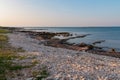 Idyllic rocky beach in tourist coastal town Medulin, Istria peninsula, Croatia, Europe. Panoramic view of rugged coastline Royalty Free Stock Photo