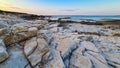 Idyllic rocky beach in tourist coastal town Medulin, Istria peninsula, Croatia, Europe. Panoramic view of rugged coastline Royalty Free Stock Photo