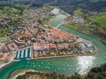 Idyllic rural landscape with a small village nestled on the banks of water in Basque Country Royalty Free Stock Photo