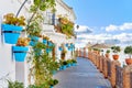 Idyllic scenery empty picturesque street of small white-washed village of Mijas Royalty Free Stock Photo