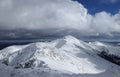 Idyllic snowy mountains in national park Low Tatras together with the highest peaks as Chopok and Dumbier. Storm and heavy clouds Royalty Free Stock Photo