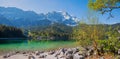 idyllic spring landscape alpine lake Eibsee and Zugspitze mountain mass, upper bavaria