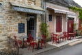 Idyllic street cafÃÂ© and restaurant in the historic village of Carennac in the Dordogne Valley